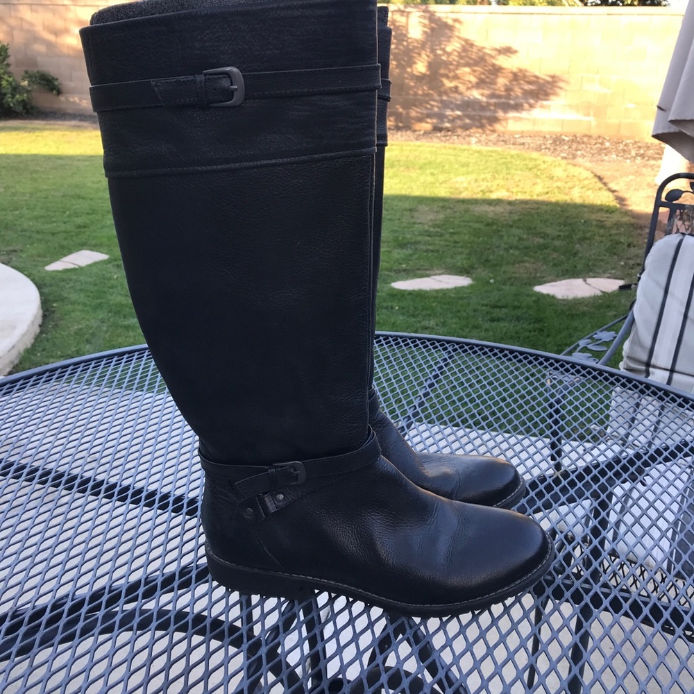 Black leather knee high boots